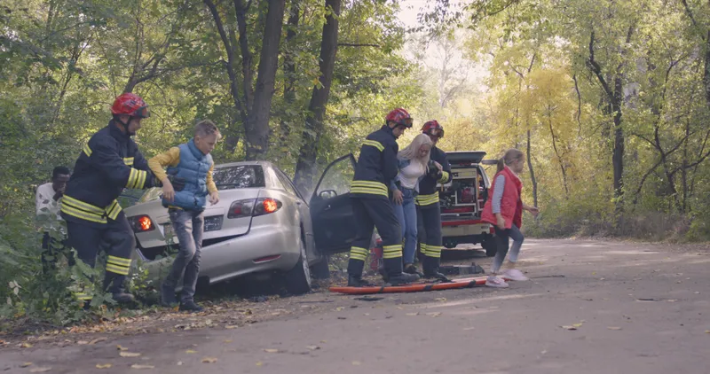 A car wreck scene with injuries.